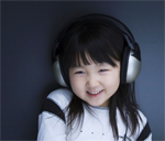 little girl with headphones
