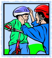 parent putting bike helmet on child